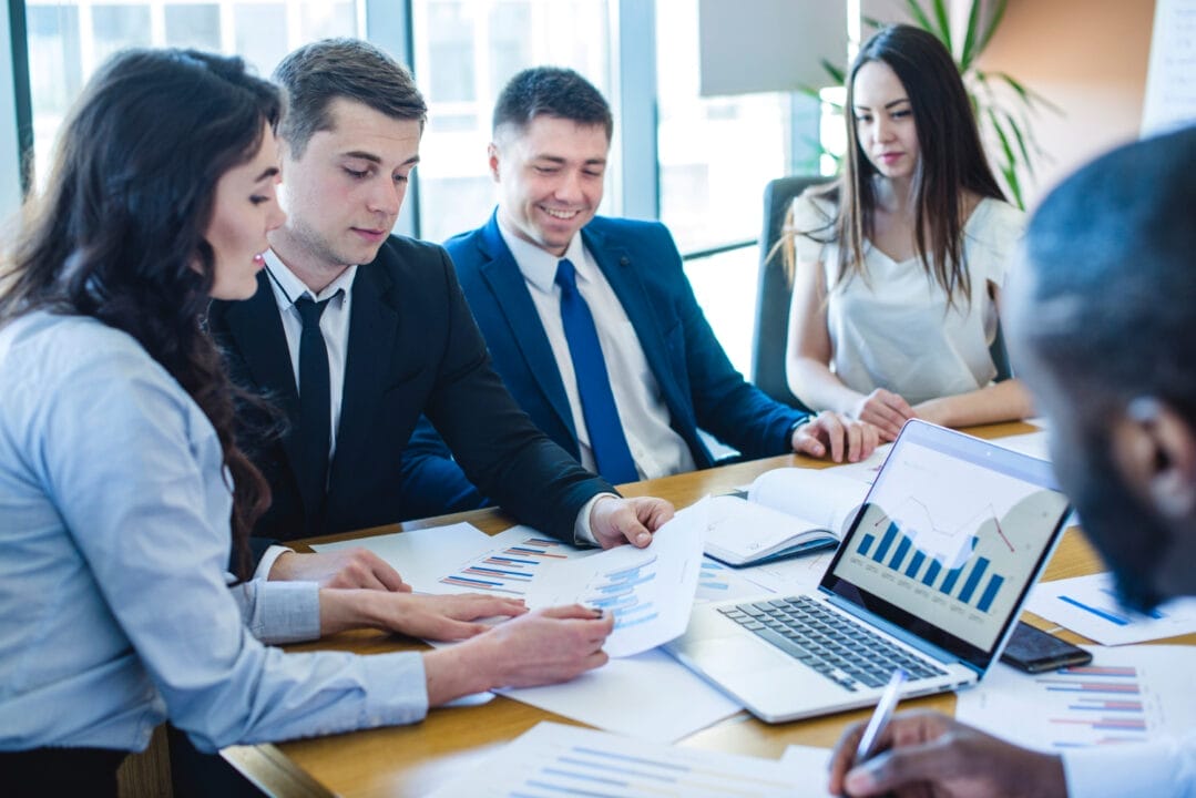 Team collaborating on legal analytics with SpineLegal Software for enhanced productivity and decision-making.