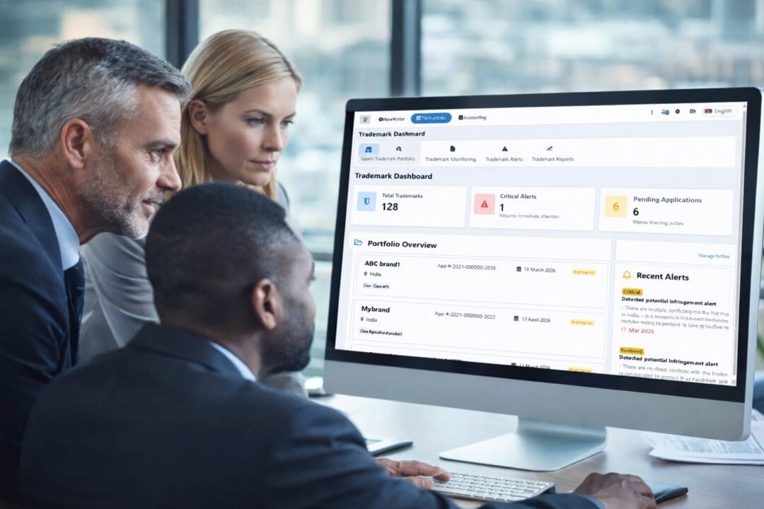 Team analyzing trademark dashboard on SpineLegal Software.